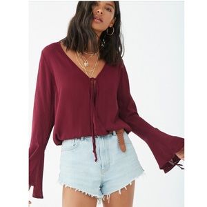 Trumpet-sleeve top deep red burgundy